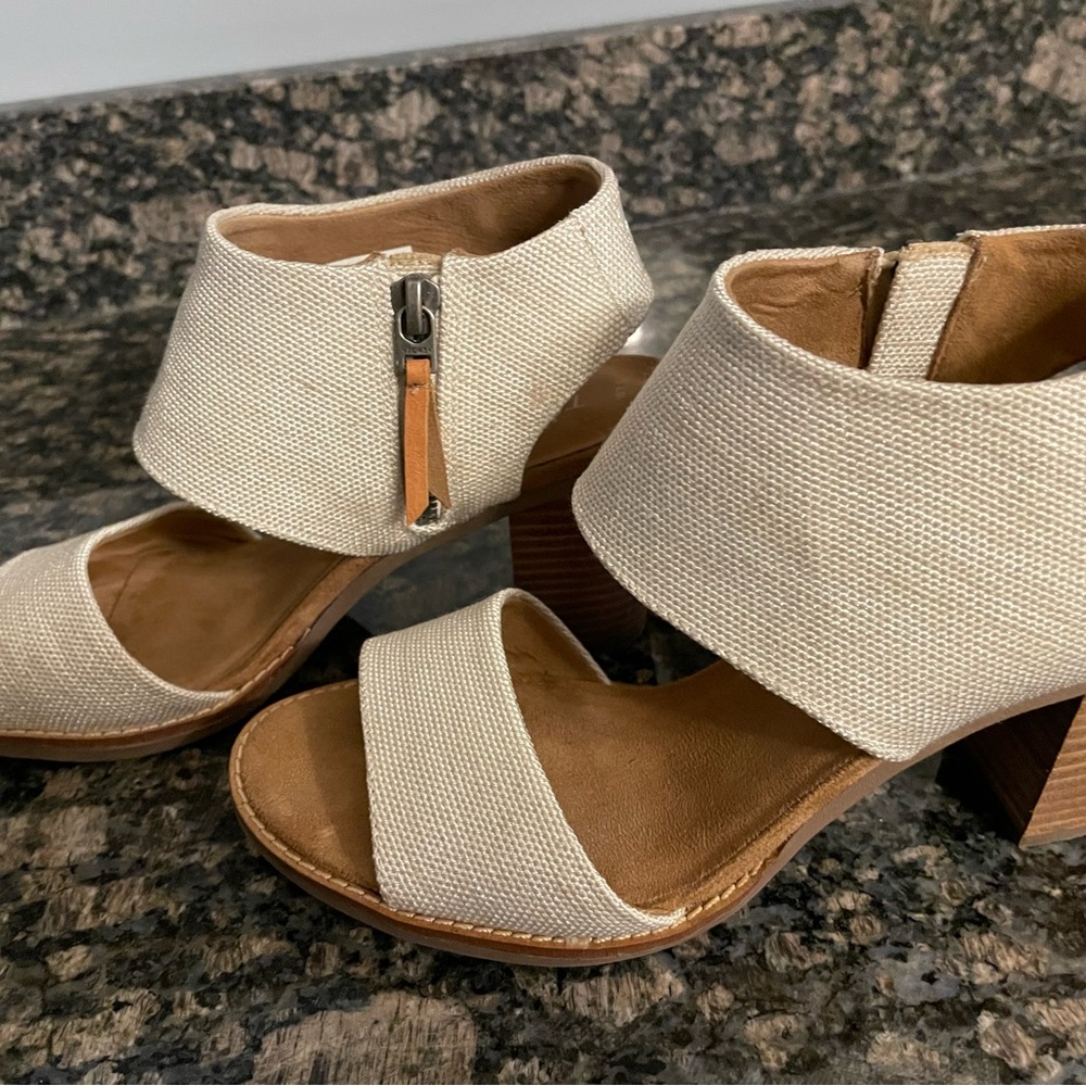 Toms cloth side, zip sandal with block heel.